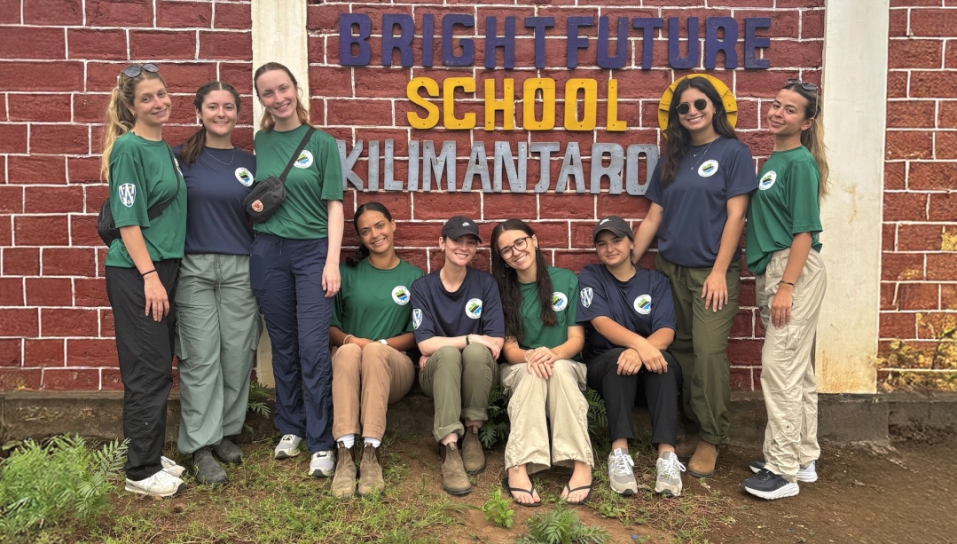 group of students outside a school in Tanzania