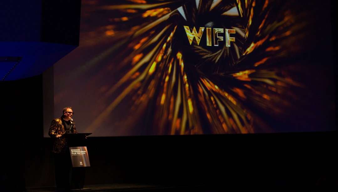 Vincent Georgie, WIFF executive director and Odette School of Business assistant professor, introduces the opening night film Mile End Kicks at the Chrysler Theatre on Oct. 23, 2025. (MILOŠ SAVIĆ/Windsor International Film Festival)