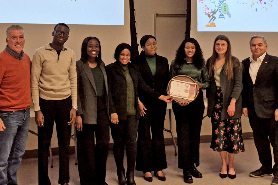 Pitch to Win participants and judges standing together for a photo.