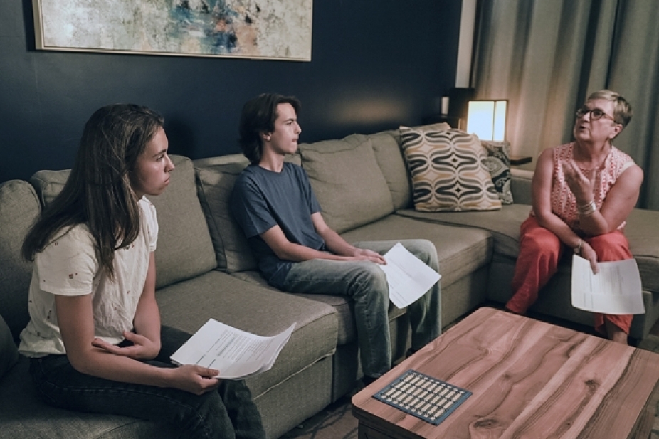 Olivia Sasso and Ewen Van Wagner review script with Charlene Senn