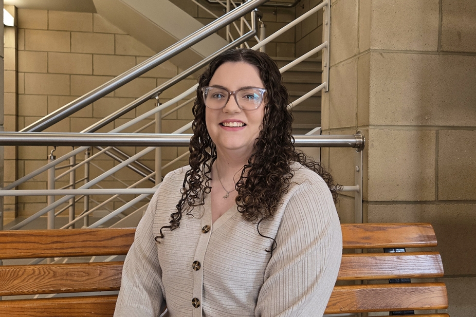 photo of Amanda Muzzatti seated in the Odette Building lobby
