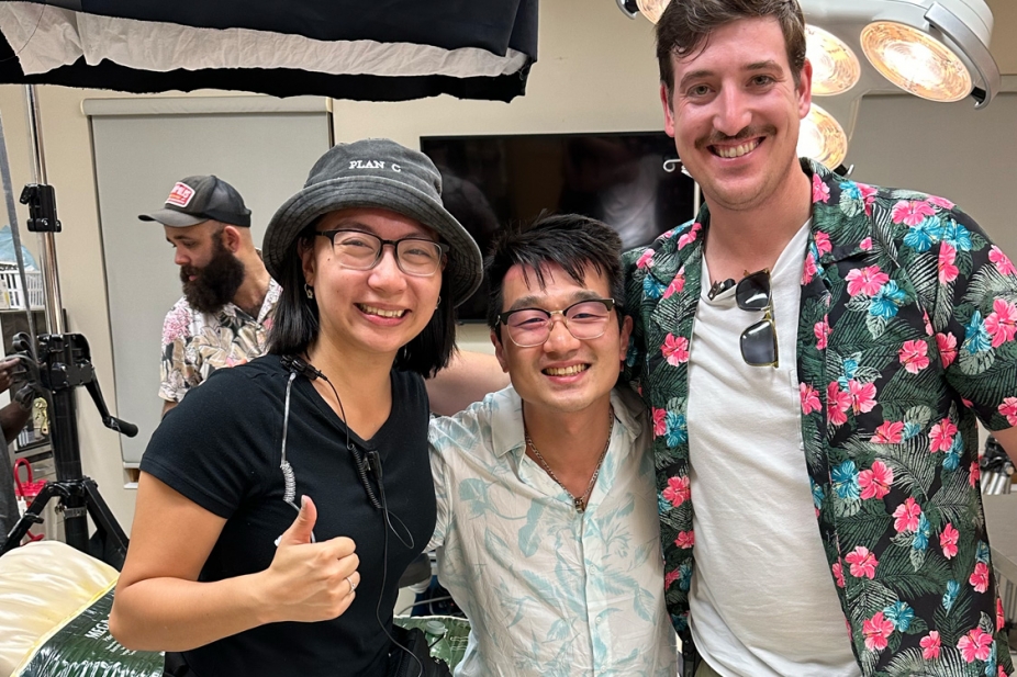 Ashley Jun poses wth Plan C production team members.