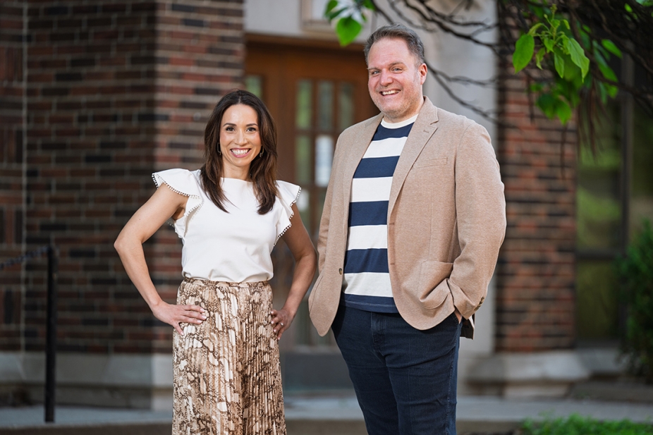 photo of Dr. Emmanuelle Richez and Dr. Vincent Georgie standing in front of Memorial Hall