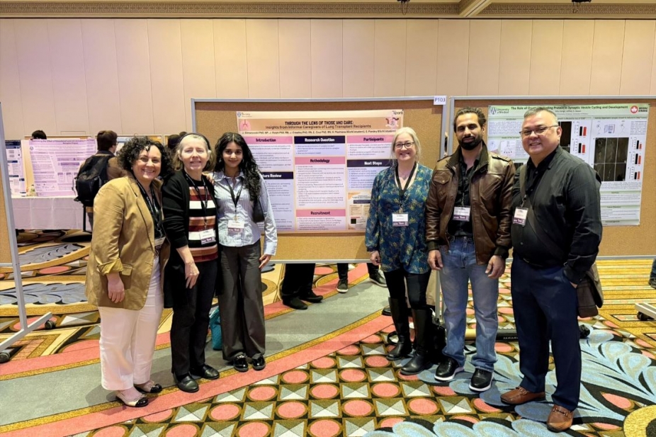 Jane and her team of colleagues and students stand with their poster at the WESPARK conference