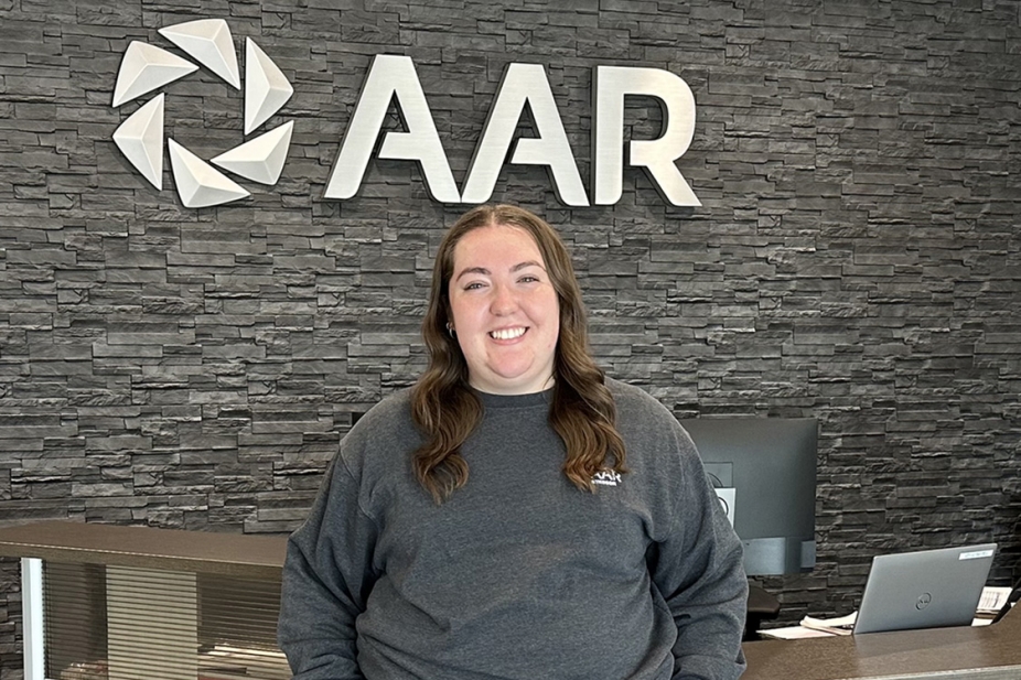 portrait of Ashley Deslippe in her office workspace