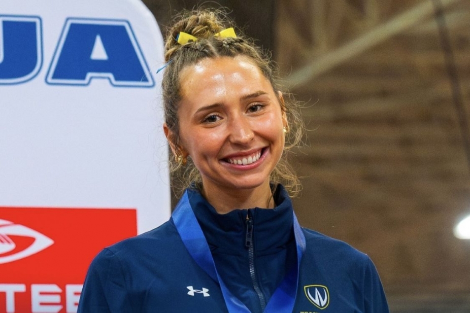 Chloe VidAmour smiling and wearing a medal