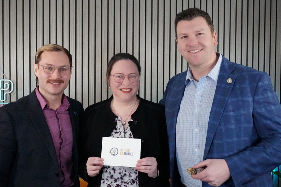 Dr. Josianne Marsan stands between Matthew Dumouchel and Ryan Donally