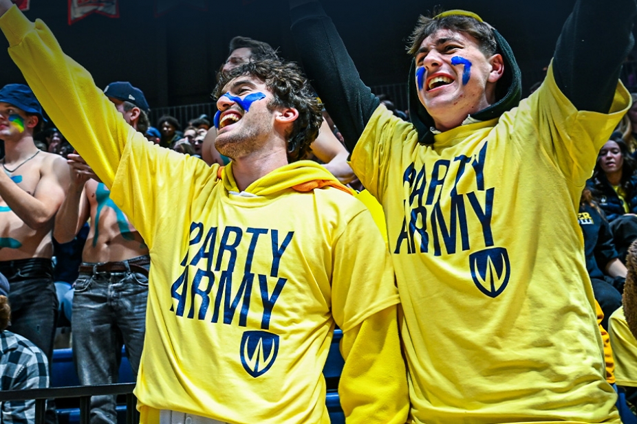 Lancers fan wearing Party Army t-shirts at a game.