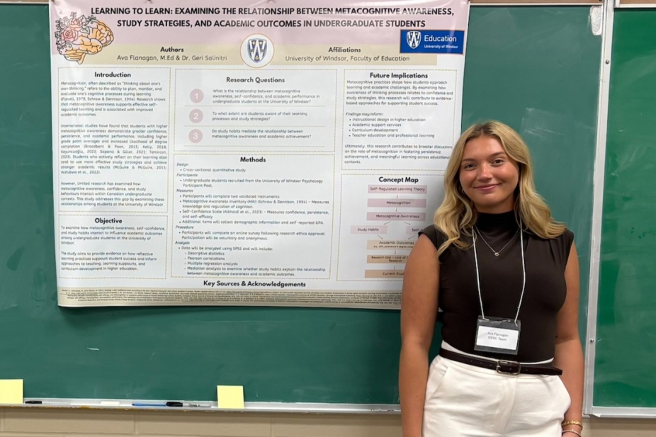 Ava Flanagan standing next to the academic poster for her metacognition research