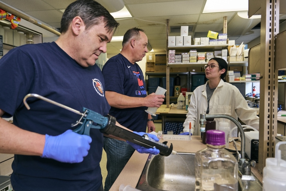 From left, Dr. Michael McKay, Steven W. Wilhelm and Brittany N. Zepernick