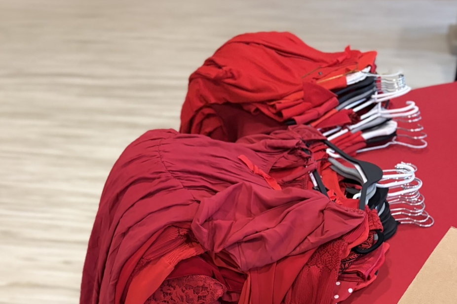 Donated red dresses were used in an installation across campus in support of Red Dress Day.