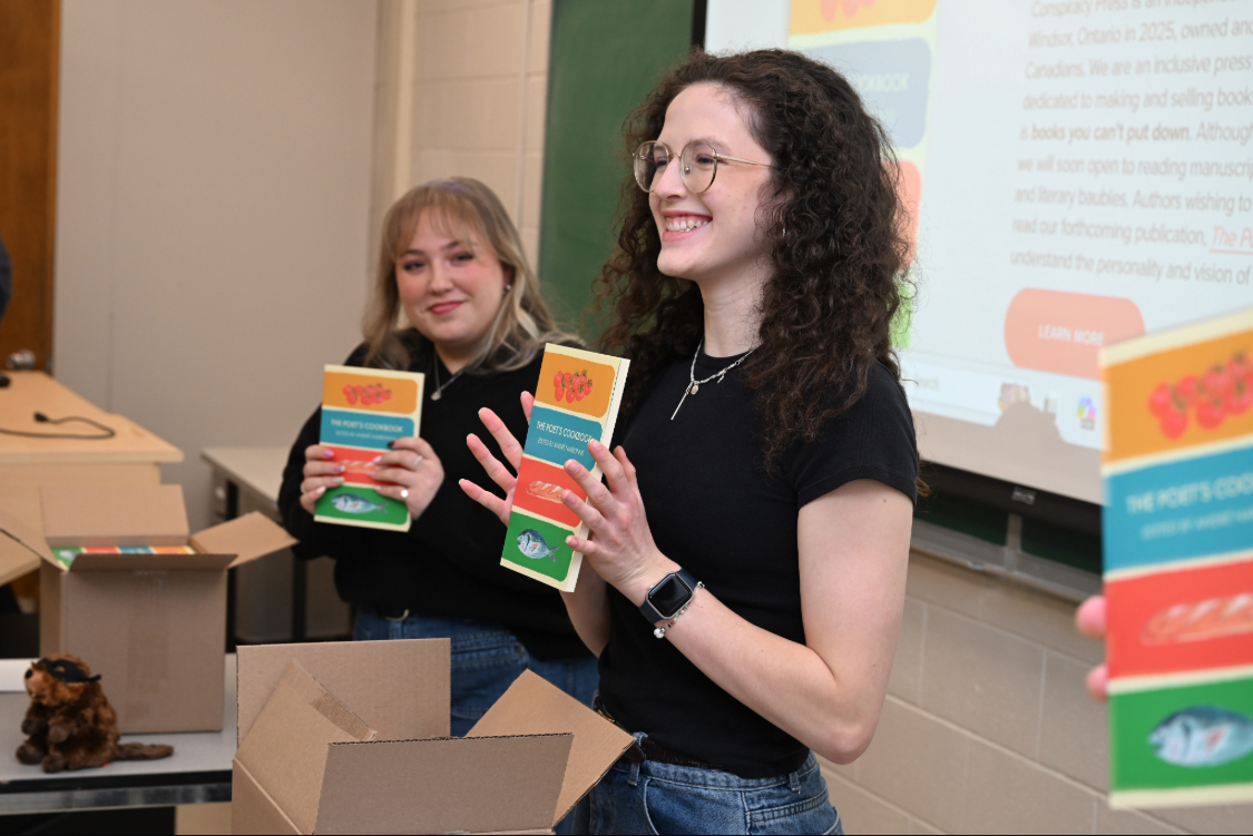 University of Windsor students in the editing and publishing practicum course had their first look at the book they spent two semesters editing and publishing, The Poet's Cookbook, which will officially launch on Thursday, April 2, 2026.