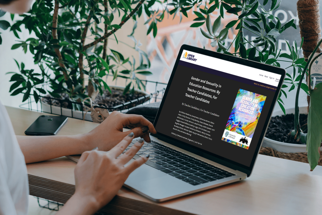 Laptop with home page for Gender and Sexuality in Education ebook homepage