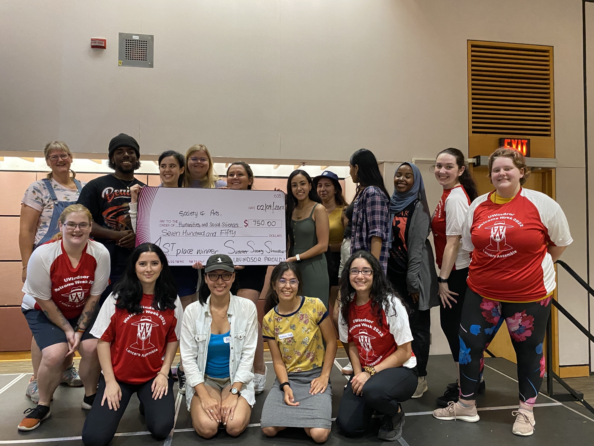 Photo of FHASS students with the Summer Society showdown cheque