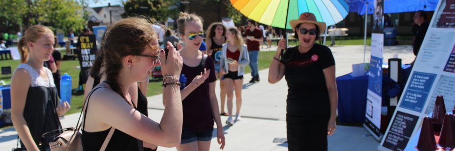 Students looking at Involvement Fair Booth