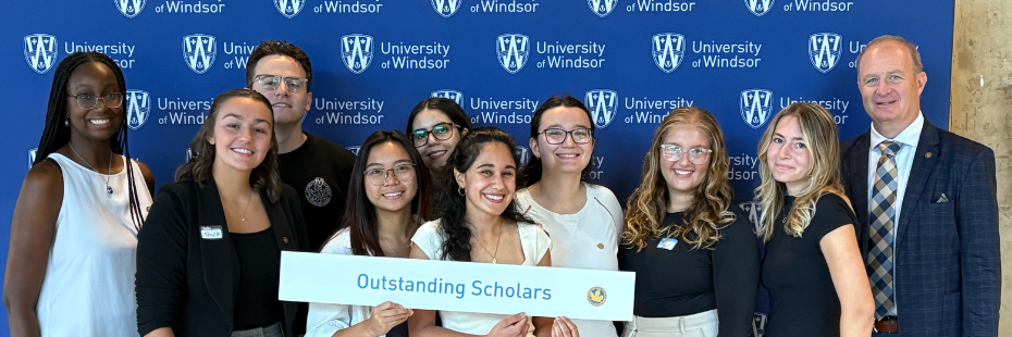 Outstanding Scholars Student Council Standing in a row.