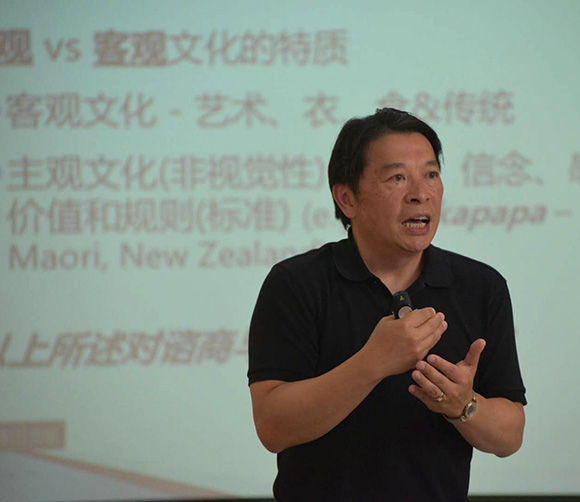 Dr. Ben C. H. Kuo speaking on stage