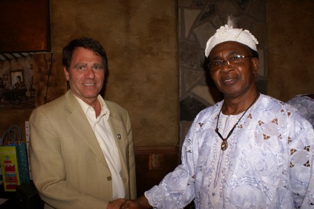 Dr. Smith congratulates Dr. Anthony Ezeife on his retirement from the University of Windsor