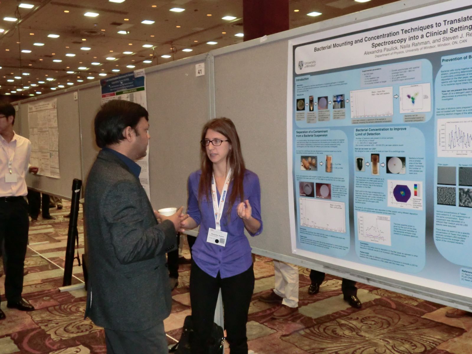 Allie standing in front of her poster