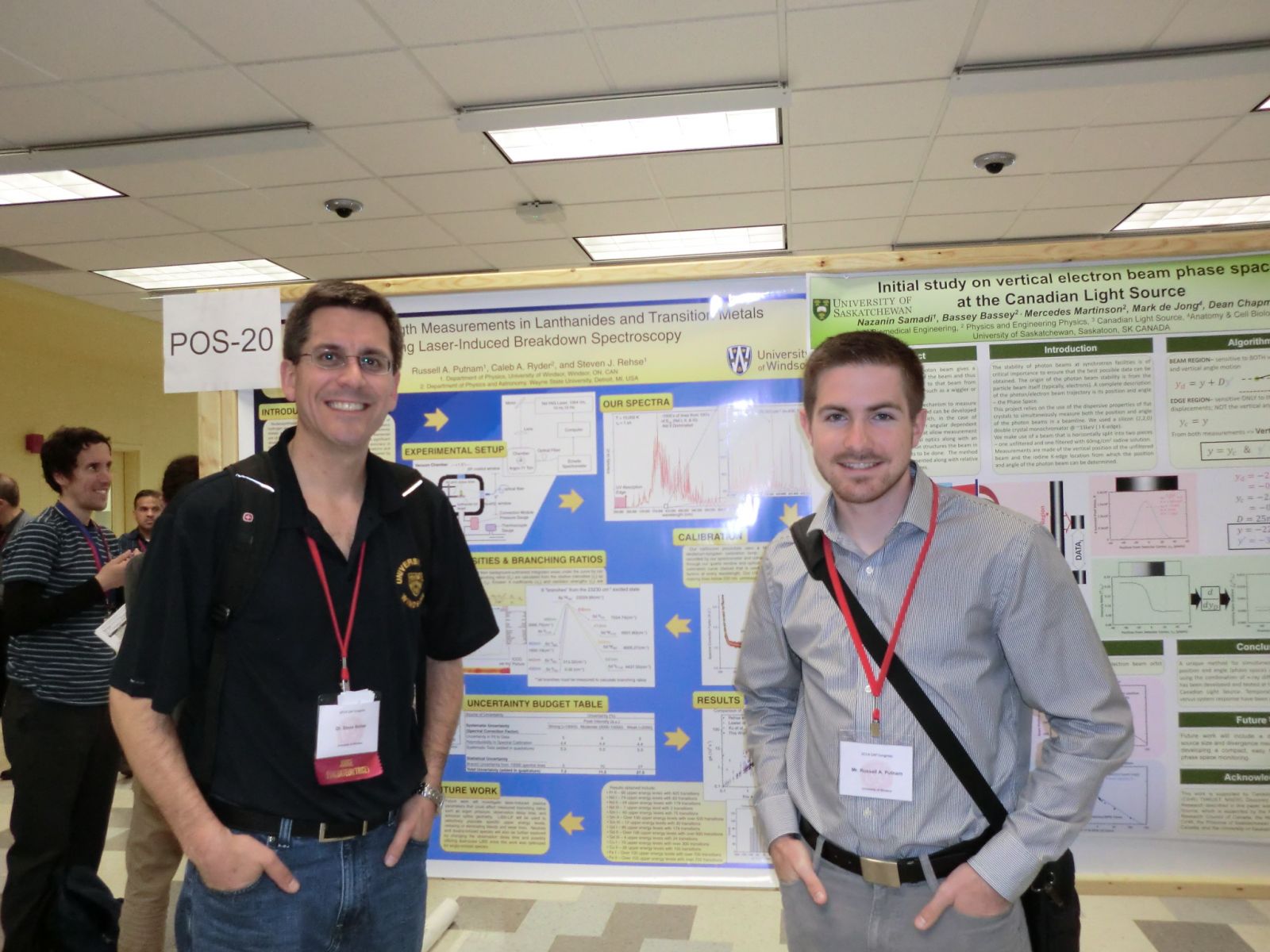 Russell Putnam with Dr Rehse in front of poster