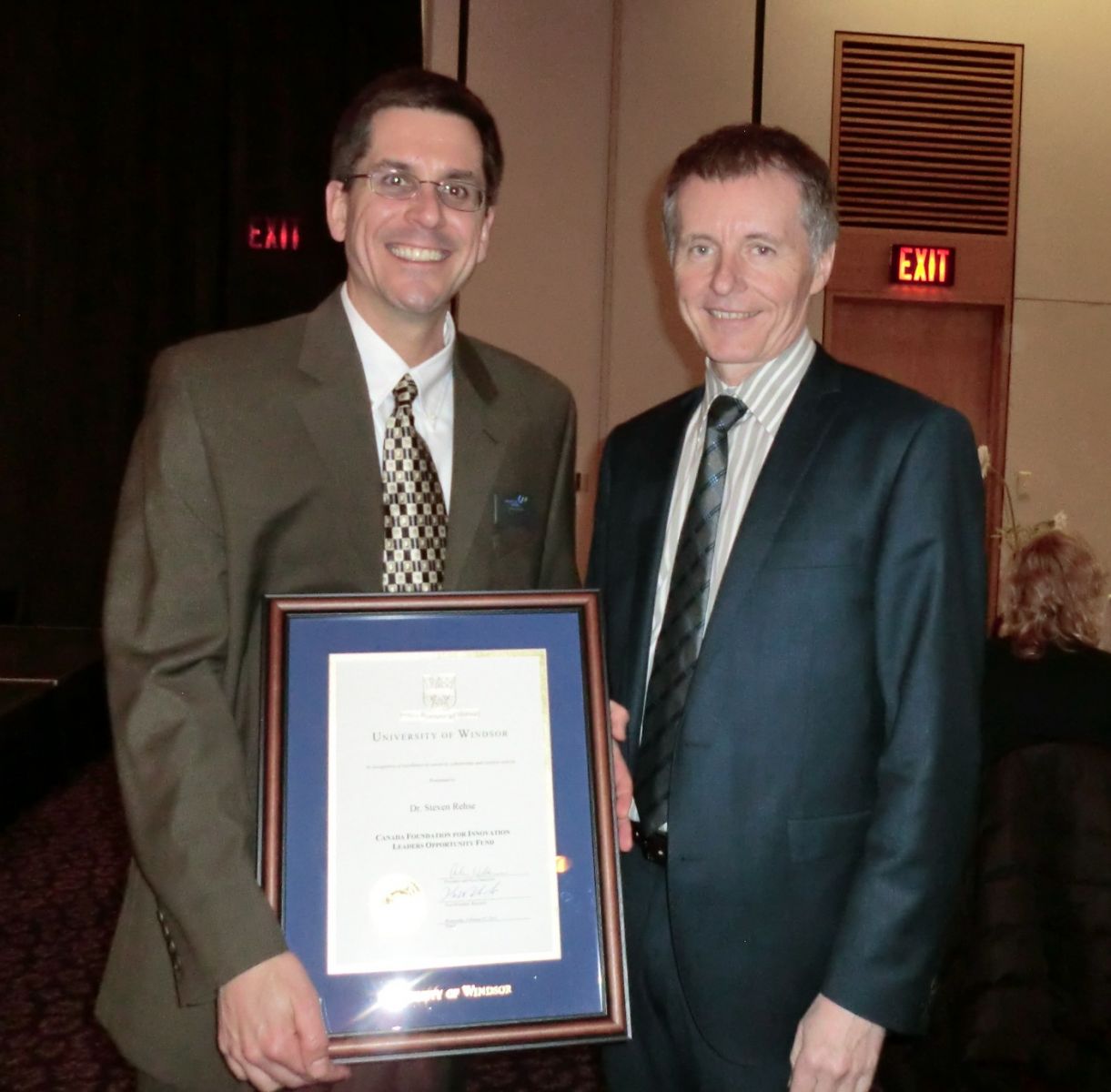 Dr. Rehse with University President and Vice-Chancellor Dr. Alan Wildeman