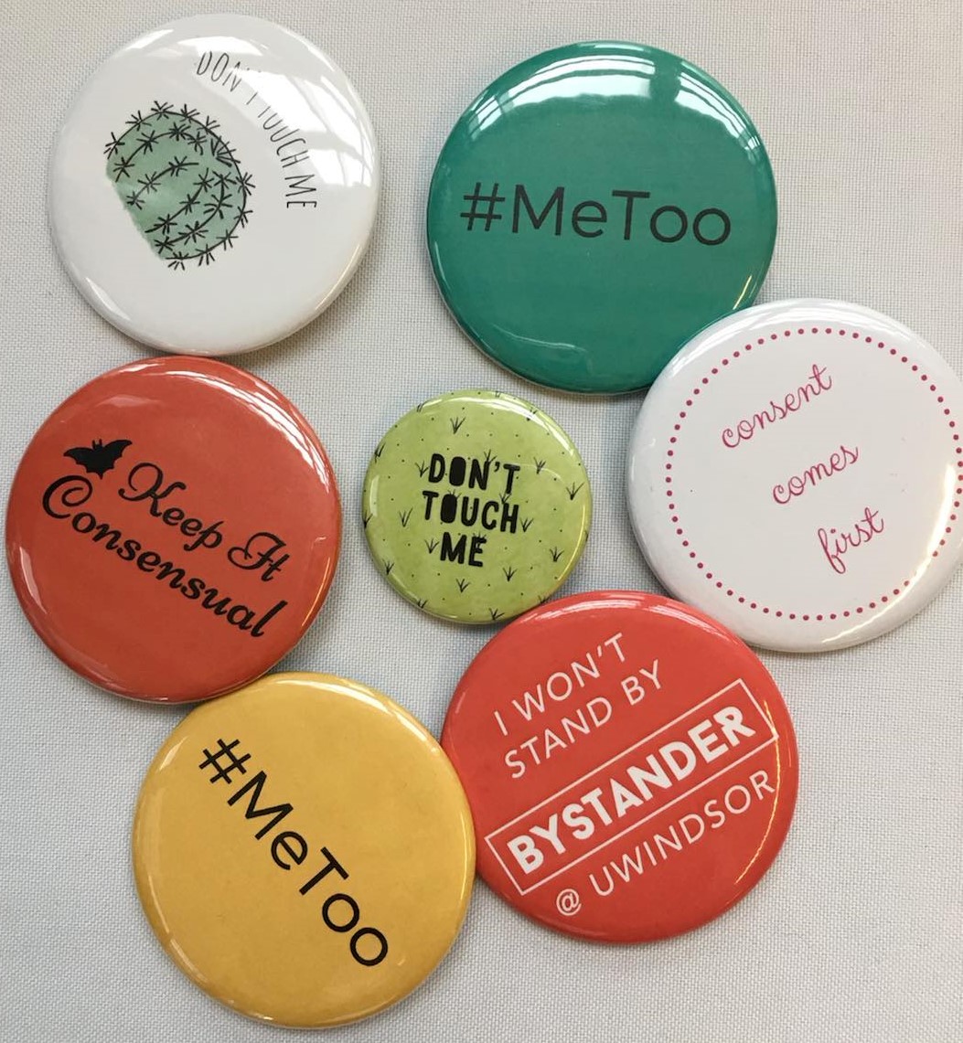 Assortment of promotional buttons for our workshops