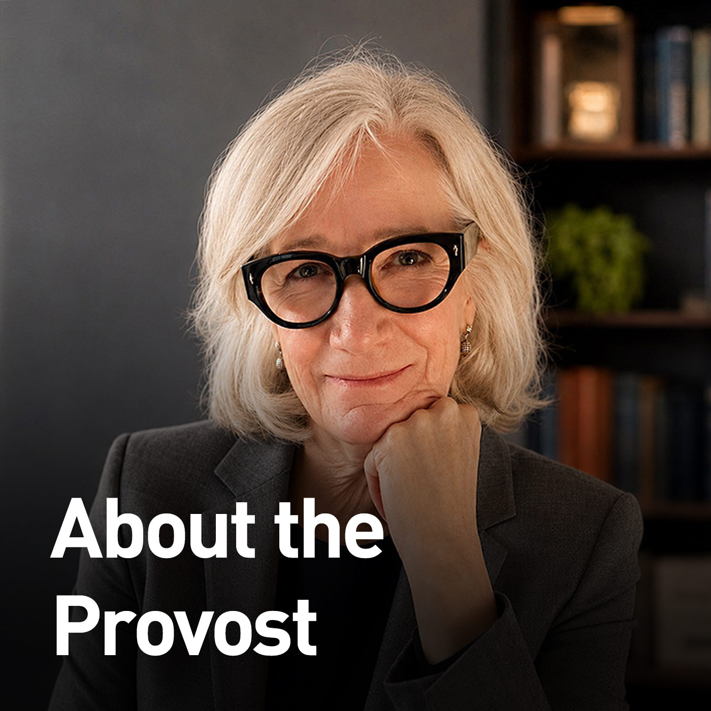 Profile photo of Dr. Barbara Crow at her office desk