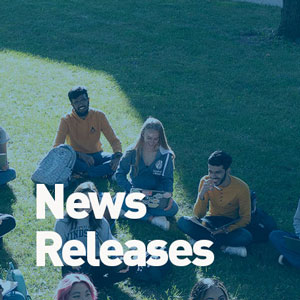 Students listen to professor Vincent Georgie during an outside lecture.
