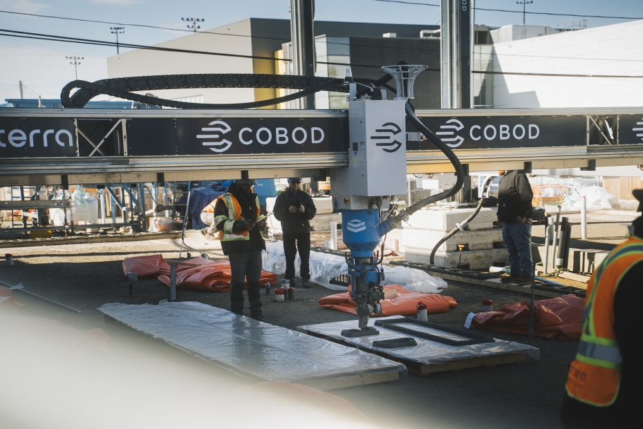 Workers operate a large-scale 3D printer on site at 1025 California Ave. as the University of Windsor begins construction on Canada’s first net-zero, multi-storey 3D-printed student residence — a milestone made possible through support from FedDev Ontario