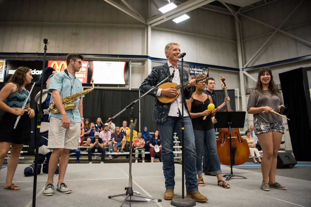 Dr. Alan Wildeman brings music to the moment as new students celebrate the start of their University of Windsor journey during Welcome Week.