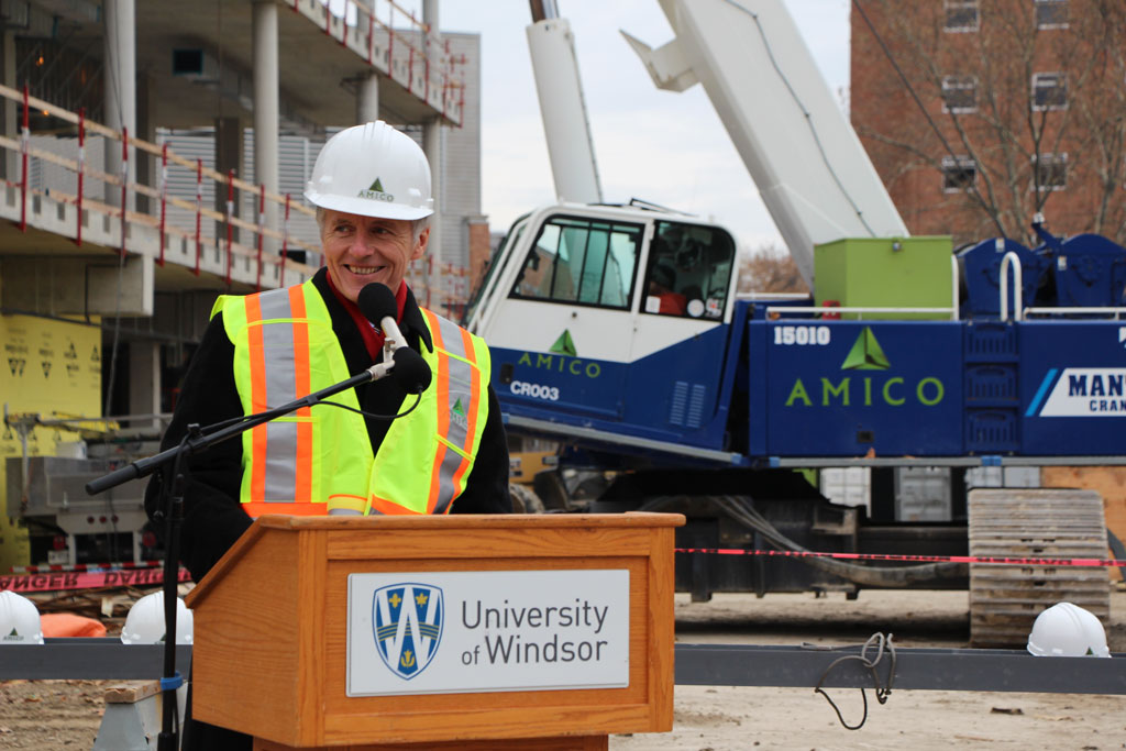 Dr. Alan Wildeman speaks during a 2017 topping-off ceremony marking a construction milestone for the University of Windsor’s new Essex Centre of Research.