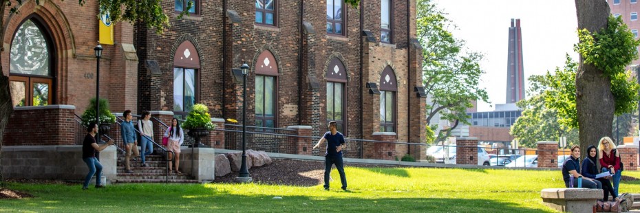 Students outside Assumption Hall exit