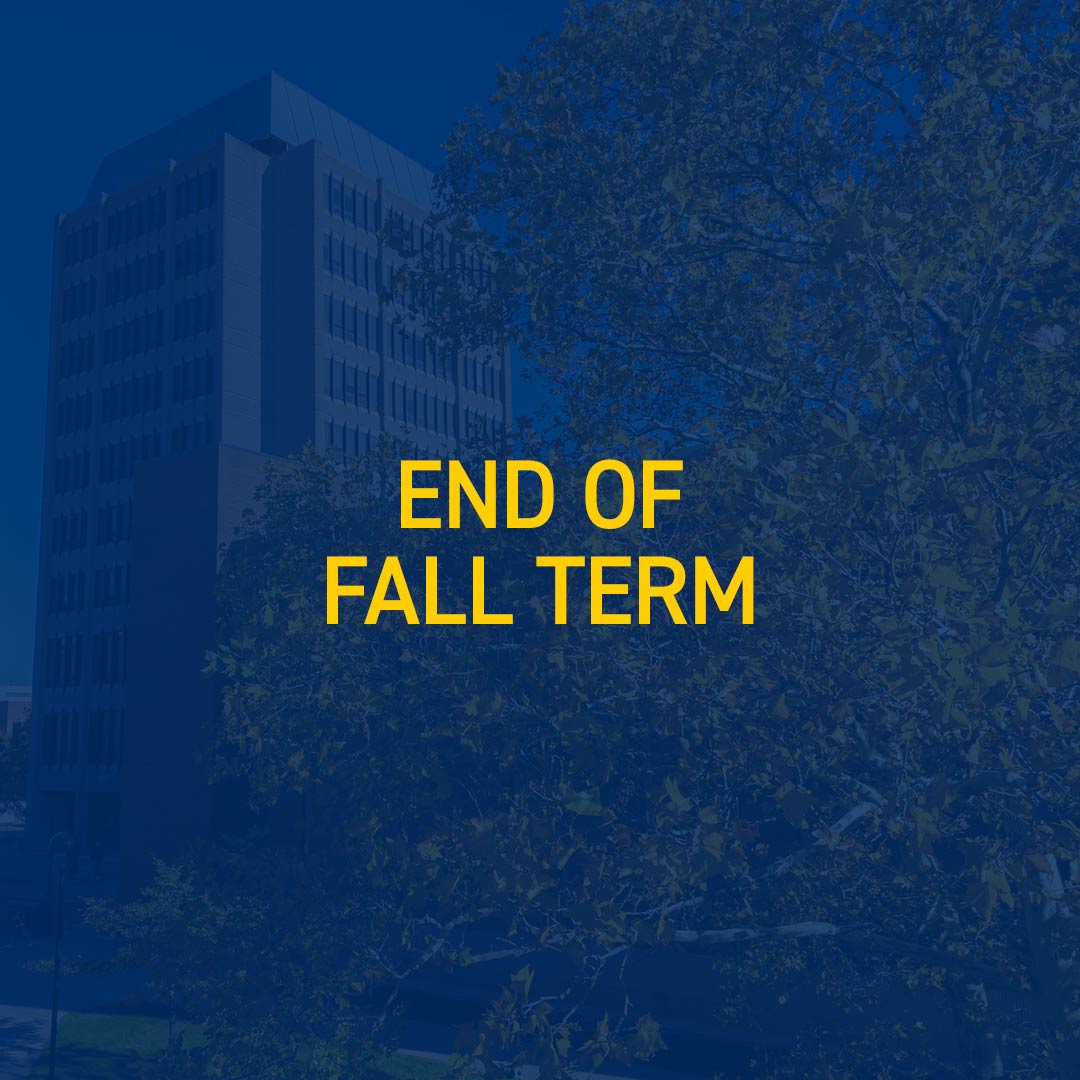 Blue colour overlay and text over photo of Laurier Hall residence building in the fall