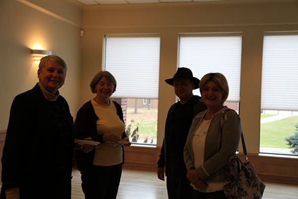 Veronika, Maureen, friend and Anna socializing midway through the meeting