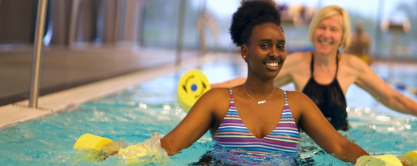 smiling women in Lancer Centre pool