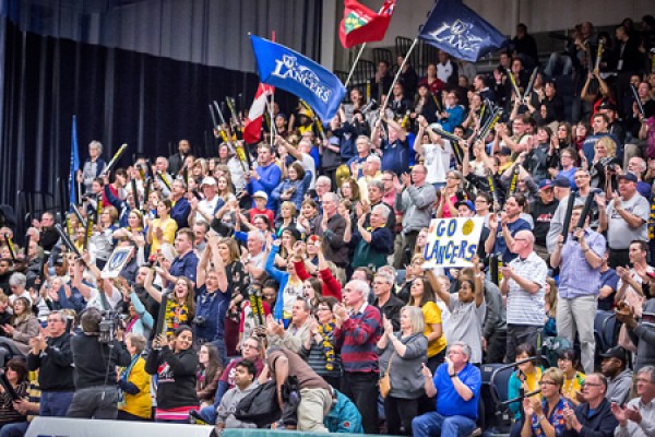 fans cheering on Lancer teams