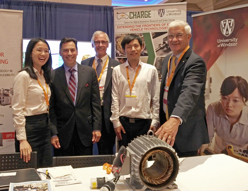 UWindsor researchers Chunyan Lai (left) and Guodong Feng (second from right) meet with Ontario economic development minister Brad Duguid, APMA chair Roy Verstraete, and government auto advisor Ray Tanguay at the association’s conference on Wednesday, June 14.