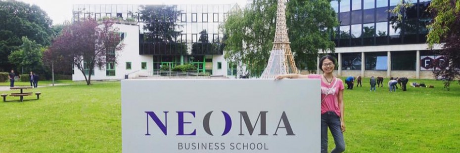 Exchange student with NEOMA sign