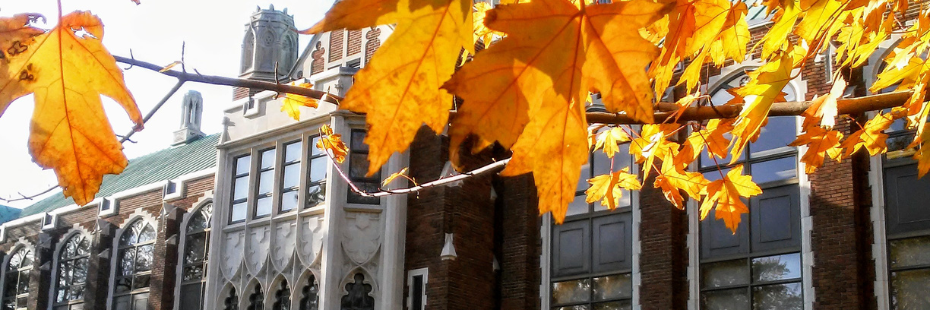 dillon hall with orange fall leaves