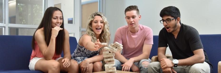 Students playing Jenga