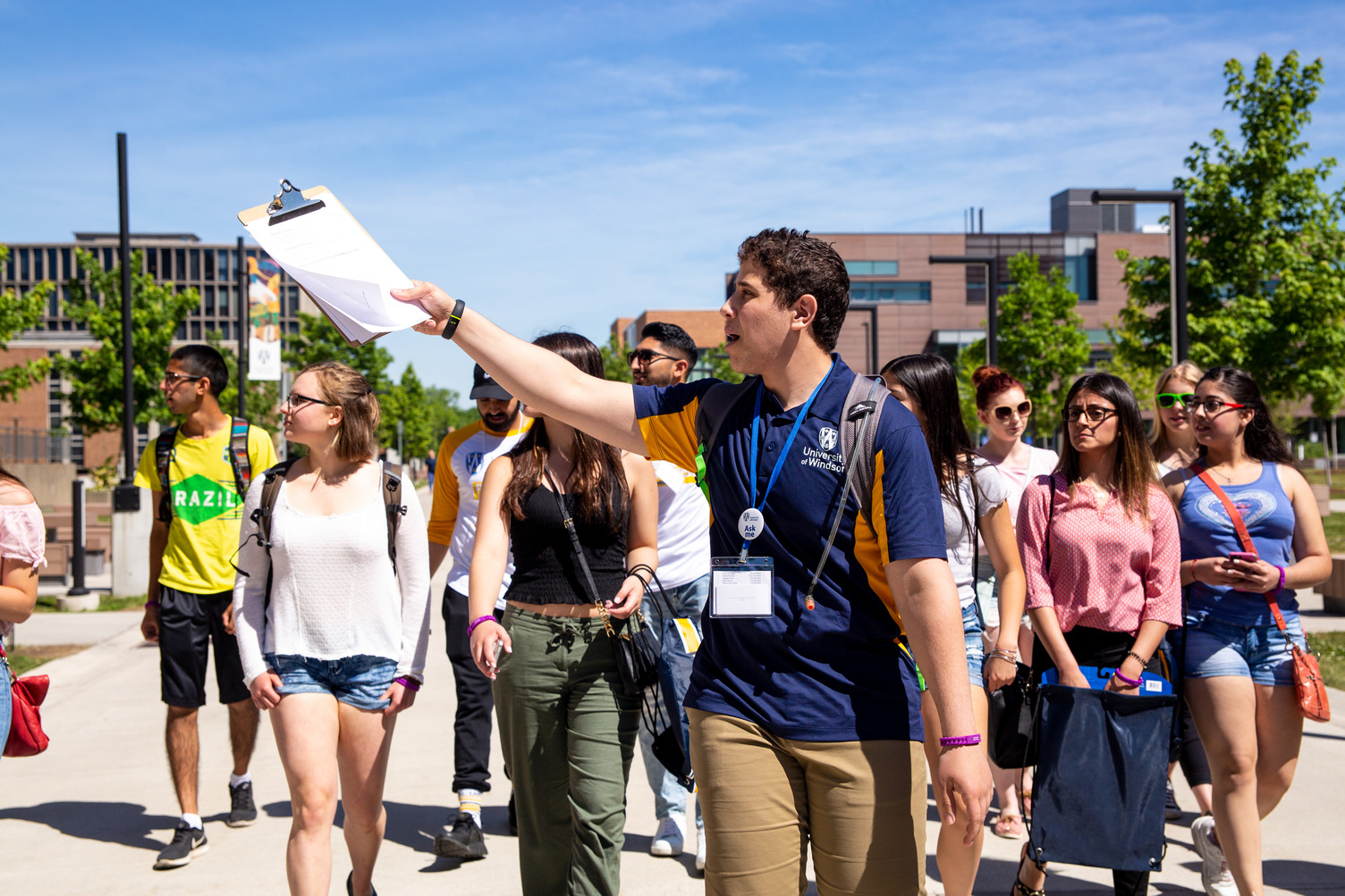 A student providing a tour on campus