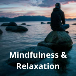 A person sitting by the water with the text "mindfulness & relaxation" written on top of the image.