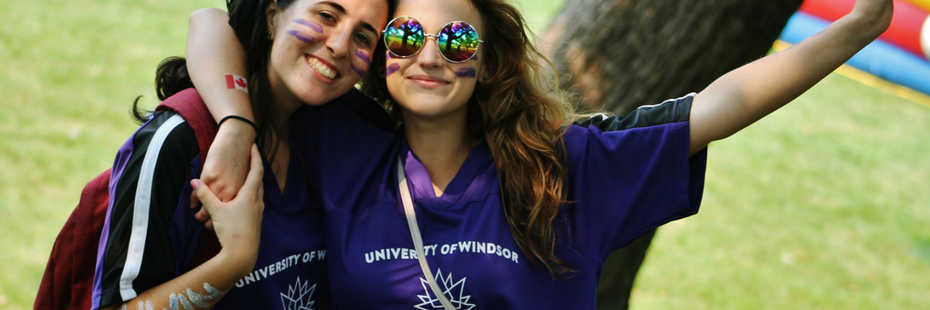 2 students posing in their Welcome week engineering team shirts