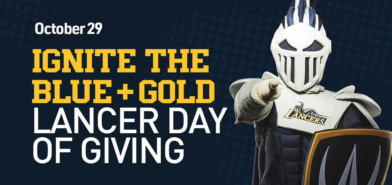 Windsor mascot pointing at the viewer, getting ready to Ignite the Blue and Gold