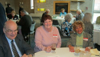 Attendees at table for Partners in Community Luncheon