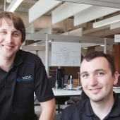  Recent graduates Matthew Lapain and Vincent Colussi are shown working at the Epic Innovation office in the Joyce Entrepreneurship Centre at the University of Windsor.