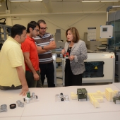 Engineering professor Hoda ElMaraghy is shown with students in the Intelligent Manufacturing Systems Centre.