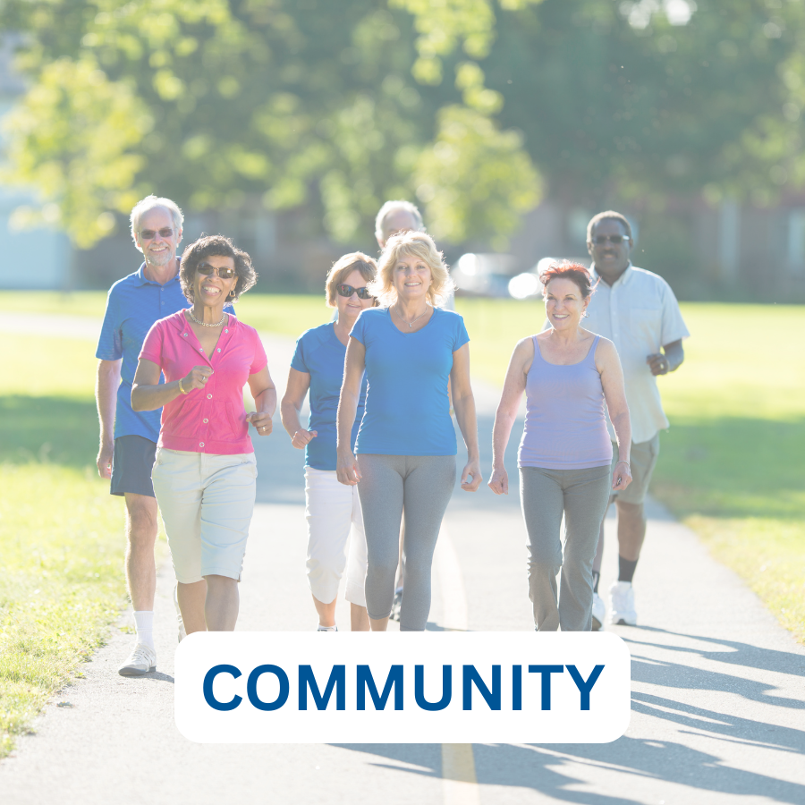 Group of diverse adults walking on a path in the sun with the word "Community" overlayed