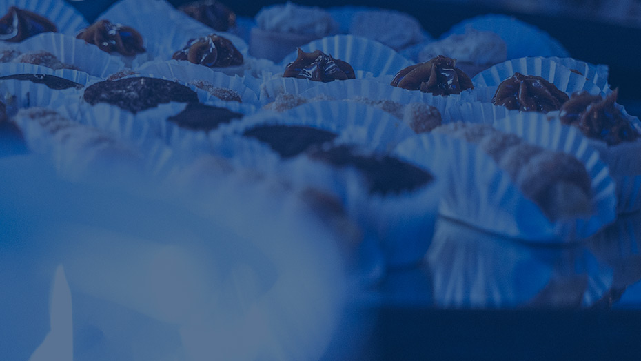 Close up of various bite-sized desserts