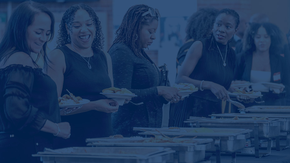Group of female attendees at buffet